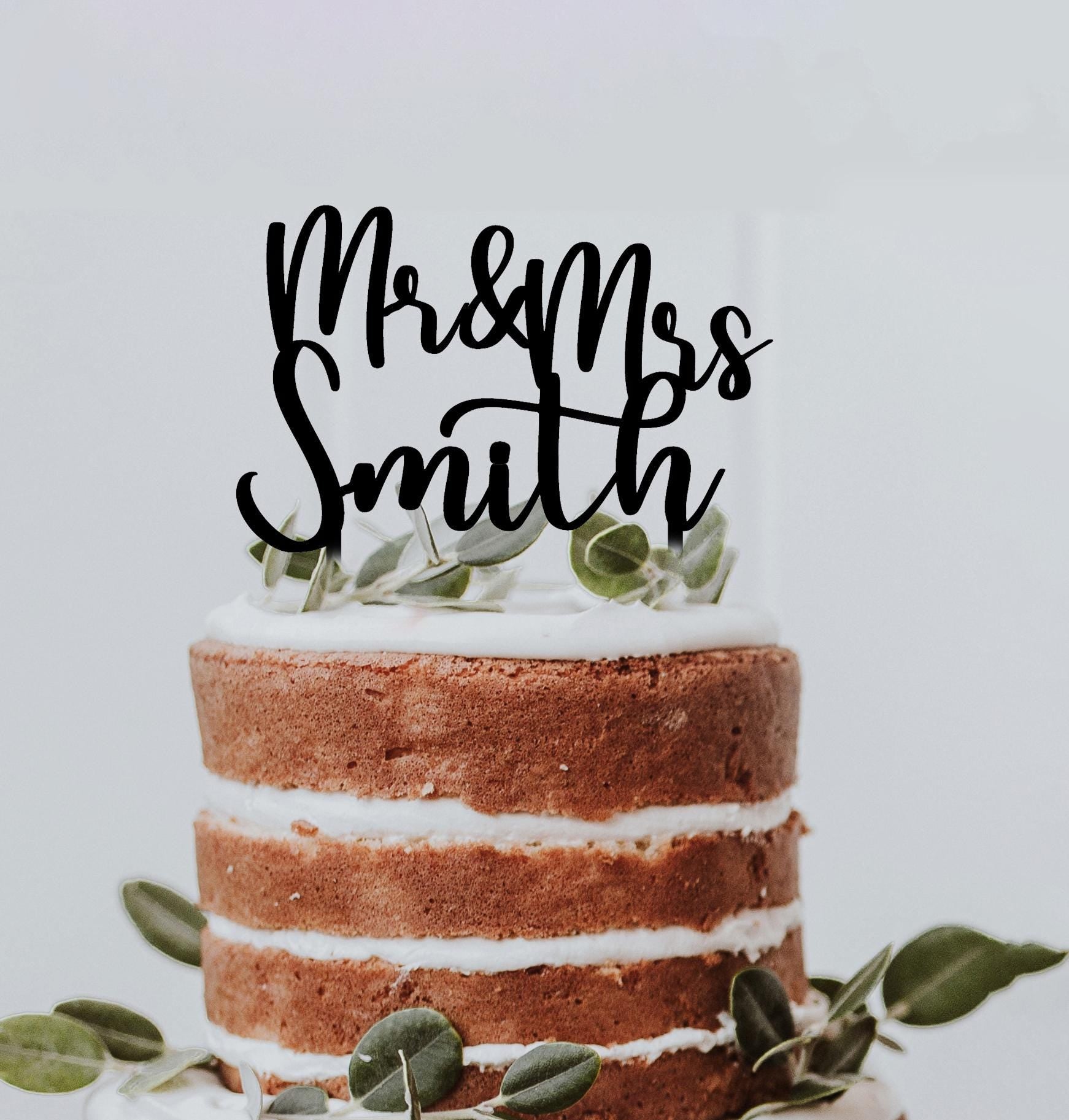 hochzeitstorte.jpg
Personalisierter Mr & Mrs Cake Topper auf einer Hochzeitstorte